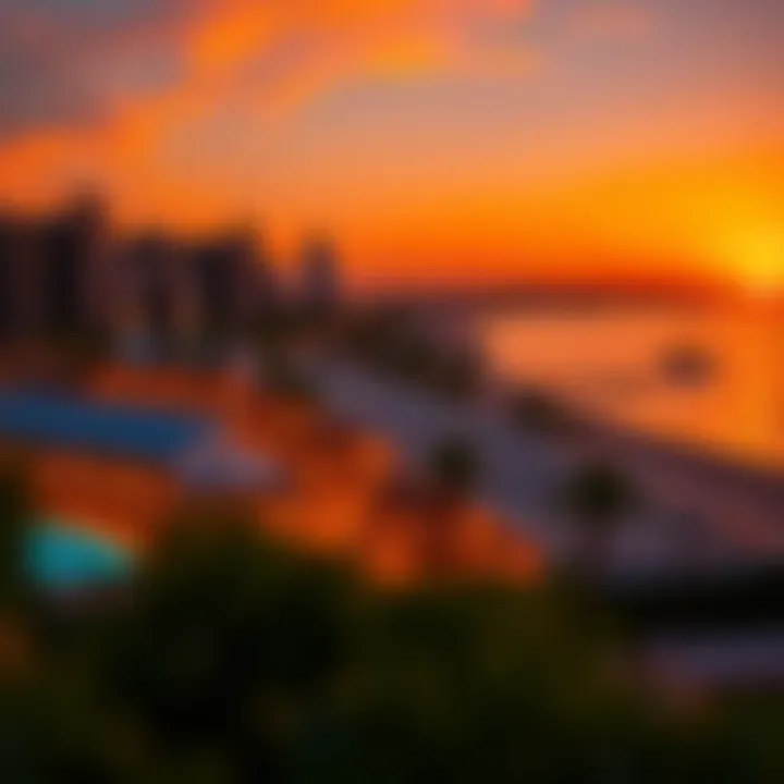 A stunning sunset view over Jumeirah Beach Residence with restaurants illuminated along the coast
